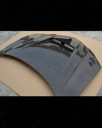 NẮP CAPO CARBON MẪU BI MAZDA 3 2009